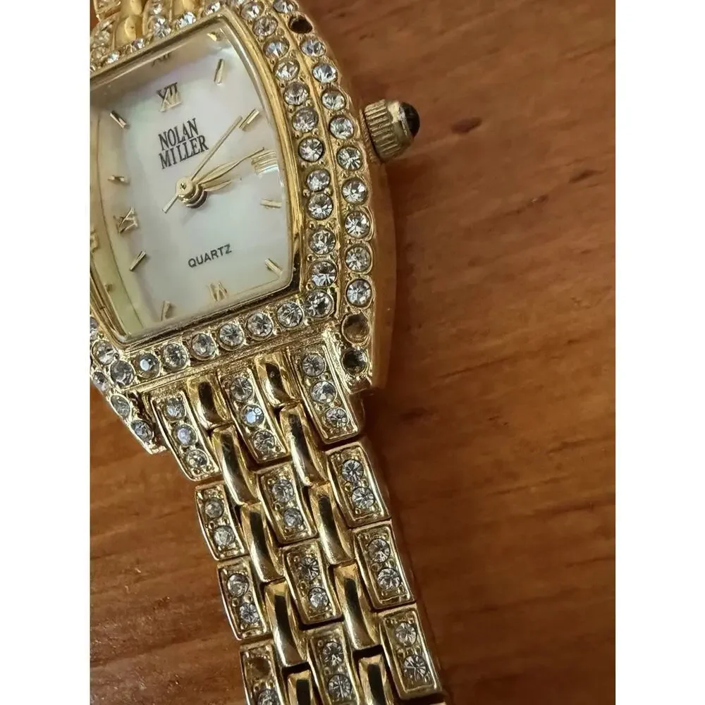 Nolan Miller Glamour Collection Crystal Gold Tone Bracelet Watch Mother Of Pearl